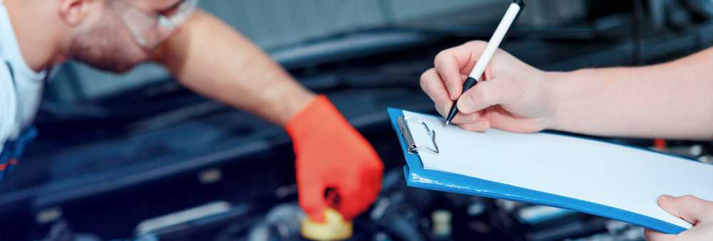 Mechanics serviicng a vehicle - Car Servicing Whitstable